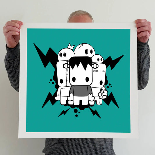 Ran holding a "It's alive" print