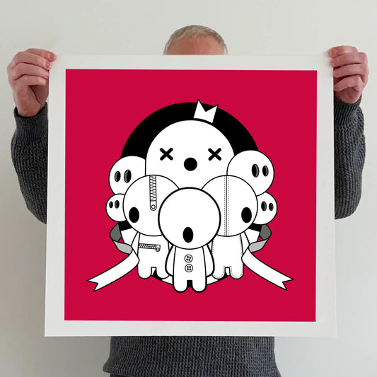 Ran holding a "The circus is in town" print