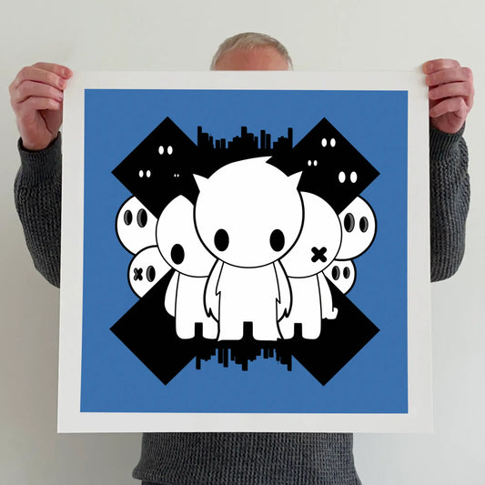 Ran holding a "The freaks come out at night" print