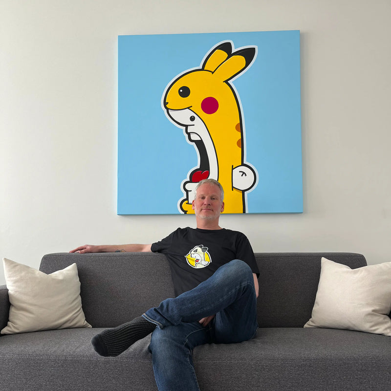 Ran Kunst in front of his Shouter vs Pikachu original painting