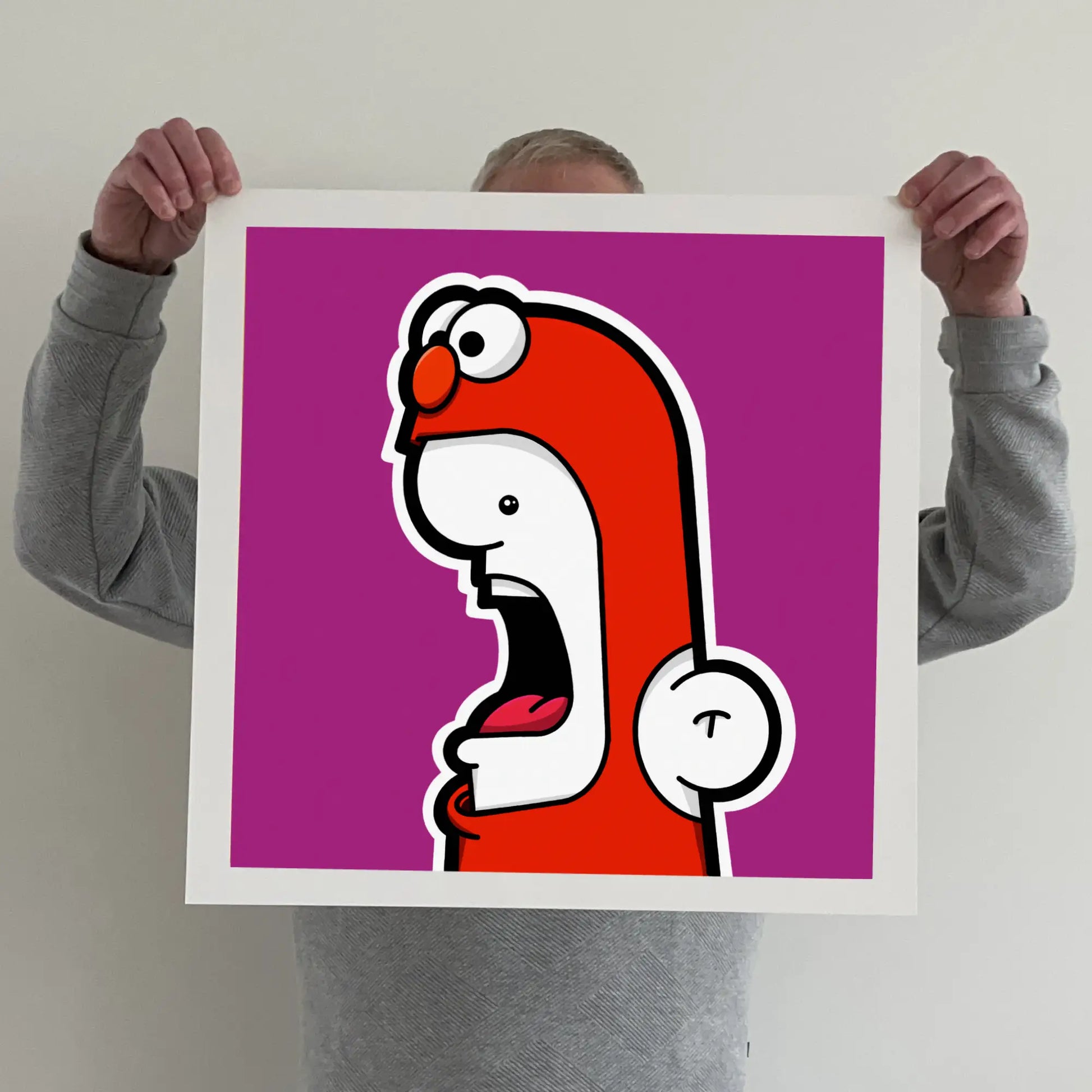 Ran holding a "shouter vs elmo" print 