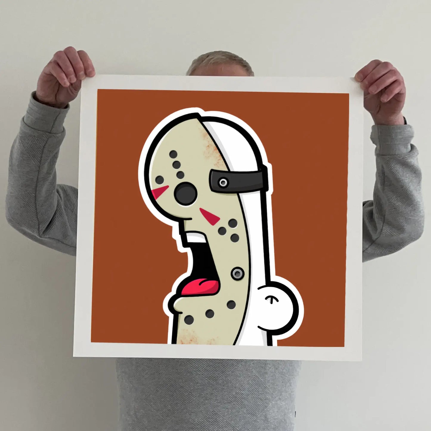 Ran holding a "shouter vs jason" print 