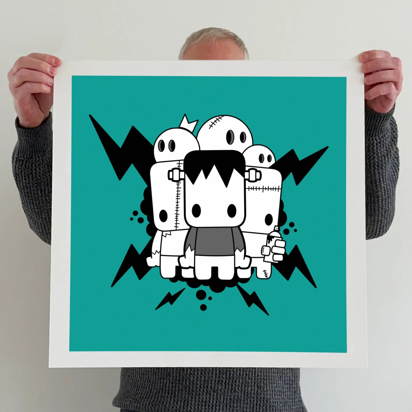Ran holding a "It's alive" print 