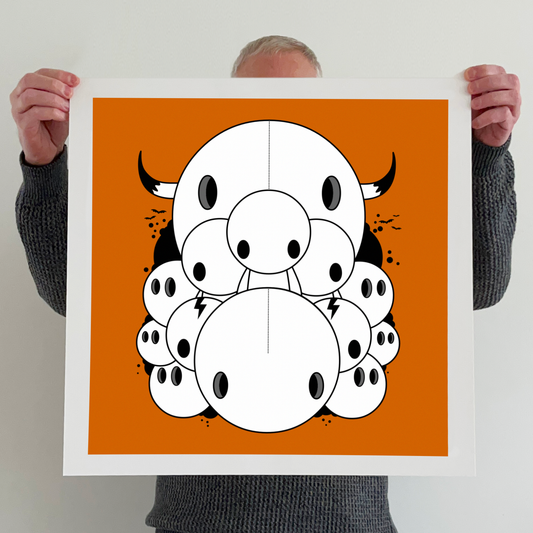 Ran holding a "It's like a jungle sometimes" print 