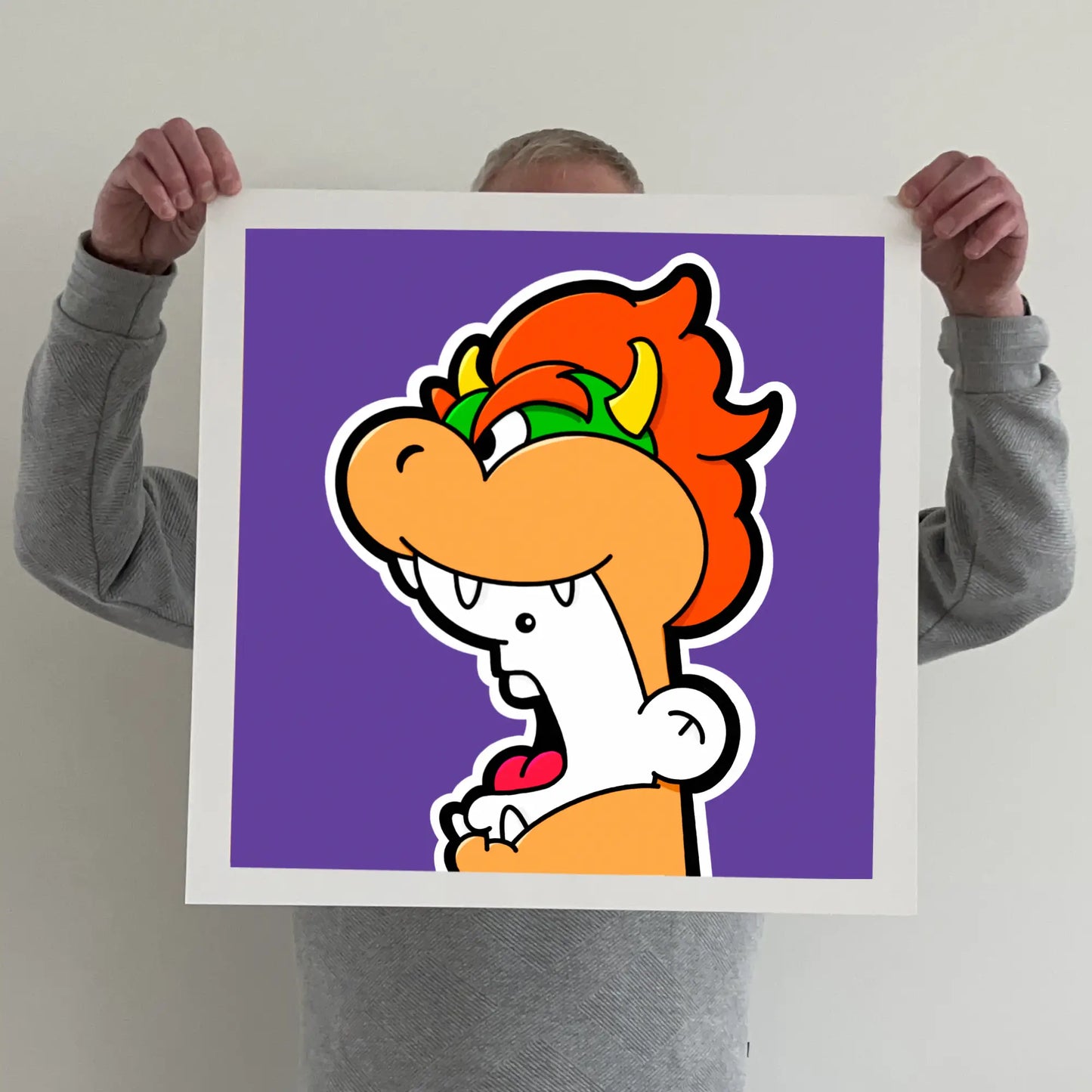 Ran holding a "shouter vs bowser" print 