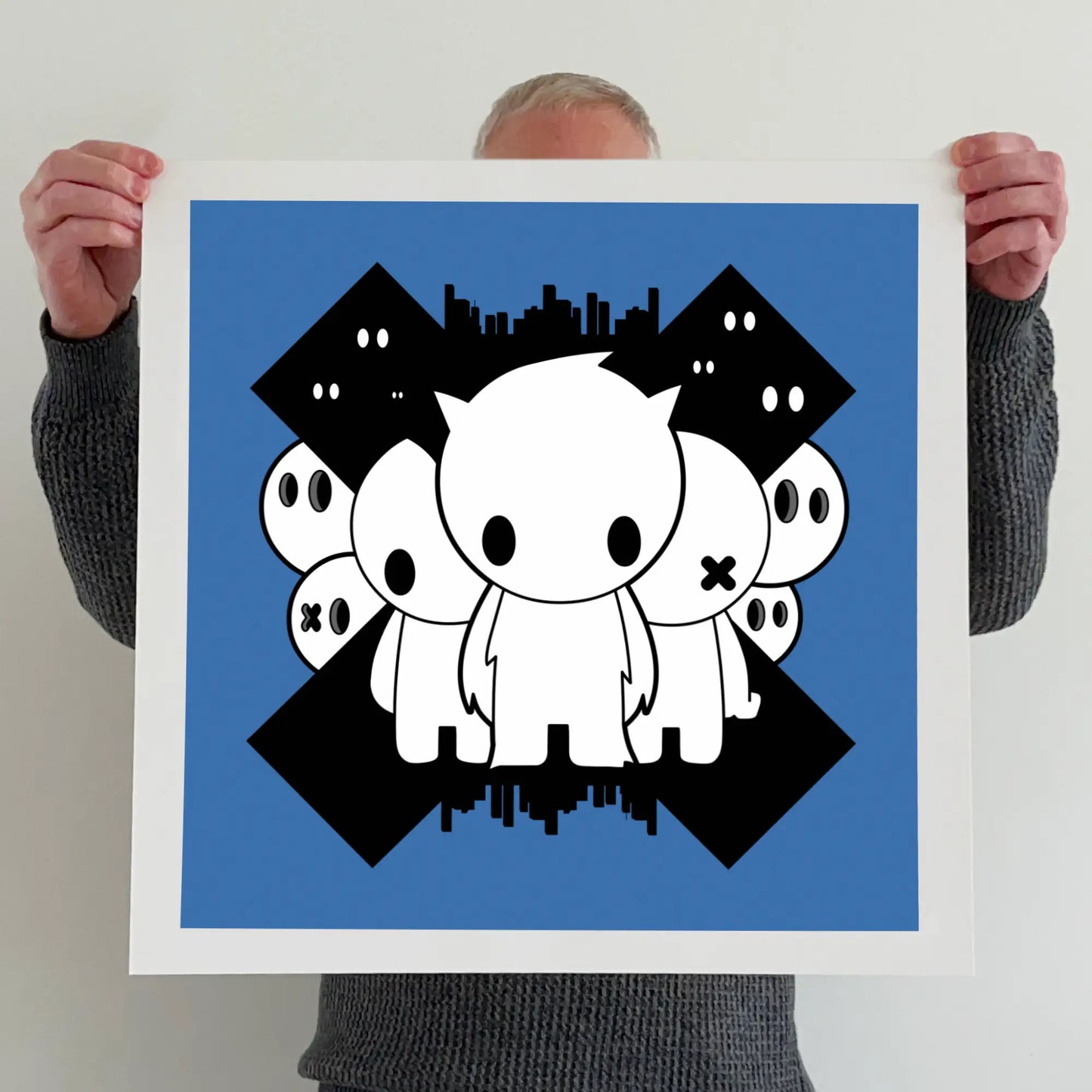 Ran holding a "The freaks come out at night" print 